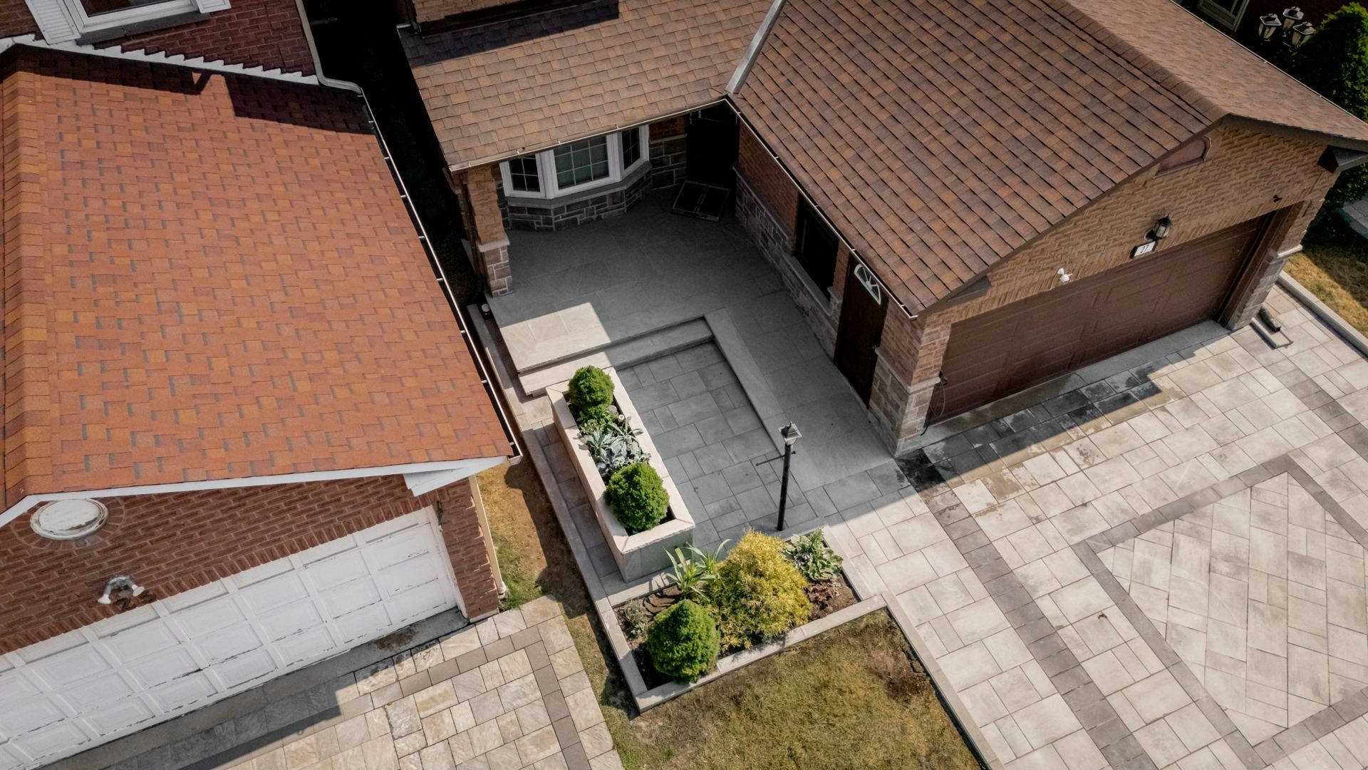 Interlock front walkway and raised planters from above